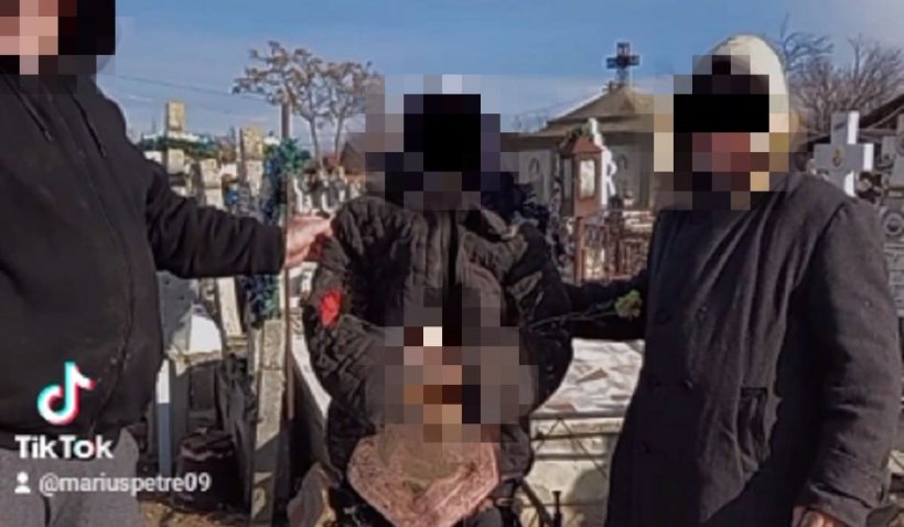 Profanare de morminte la un cimitir din Prahova. Mai mulţi bărbaţi au dansat cu cadavrul unei femei deshumate, pe ritmuri de manele – VIDEO