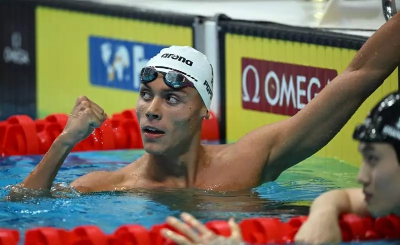 Înotătorul român David Popovici, în finalele probei de 100 m. Campionul mondial a înregistrat cel mai bun timp