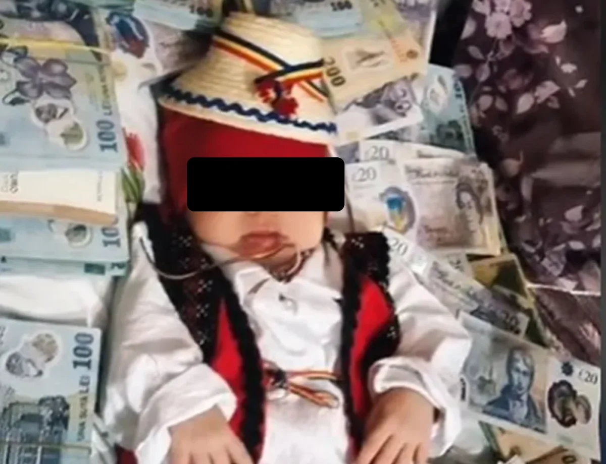 Ultimul trend la botez: Bebeluşul culcat pe un pat de bancnote
