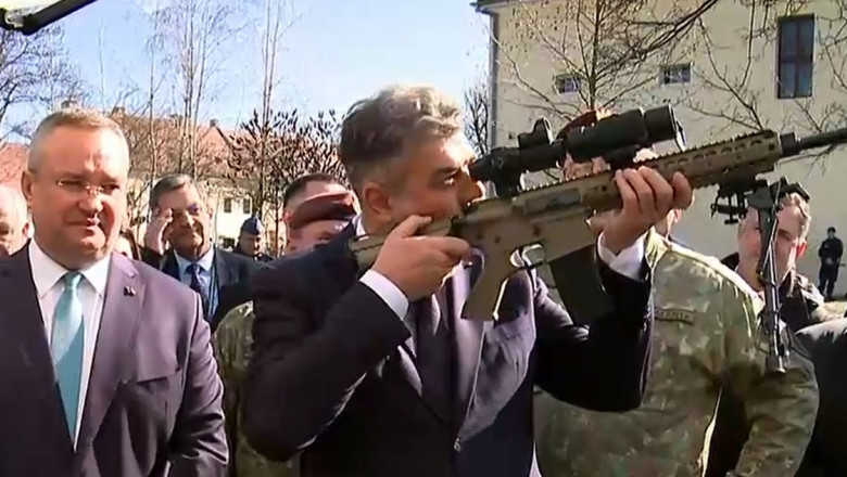 Marcel Ciolacu s-a uitat prin luneta unei arme la Lucian Bode: „Cam stai în țintă, domnule ministru!”