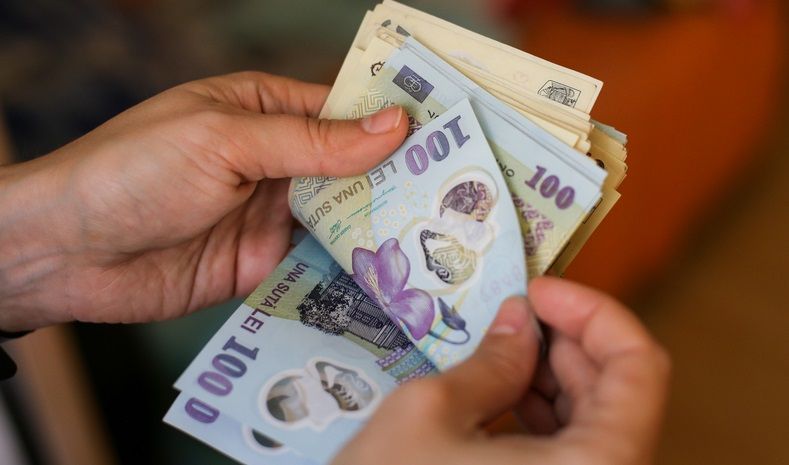 Câți bani va lua angajatul român pe salariul minim pe economie, după majorarea din iulie: Cât de mare este creșterea