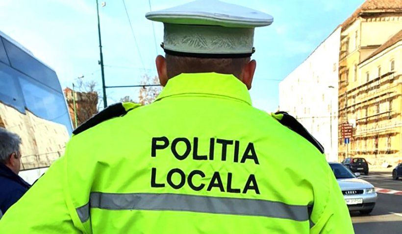 Un poliţist local a fost reținut, după ce a rupt afişe ale PSD lipite pe gardurile unor localnici
