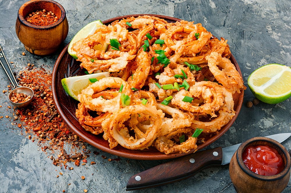 Care este secretul unor inele de calamar fragede la interior, dar crocante la exterior. Rețete delicioase pentru iubitorii de fructe de mare