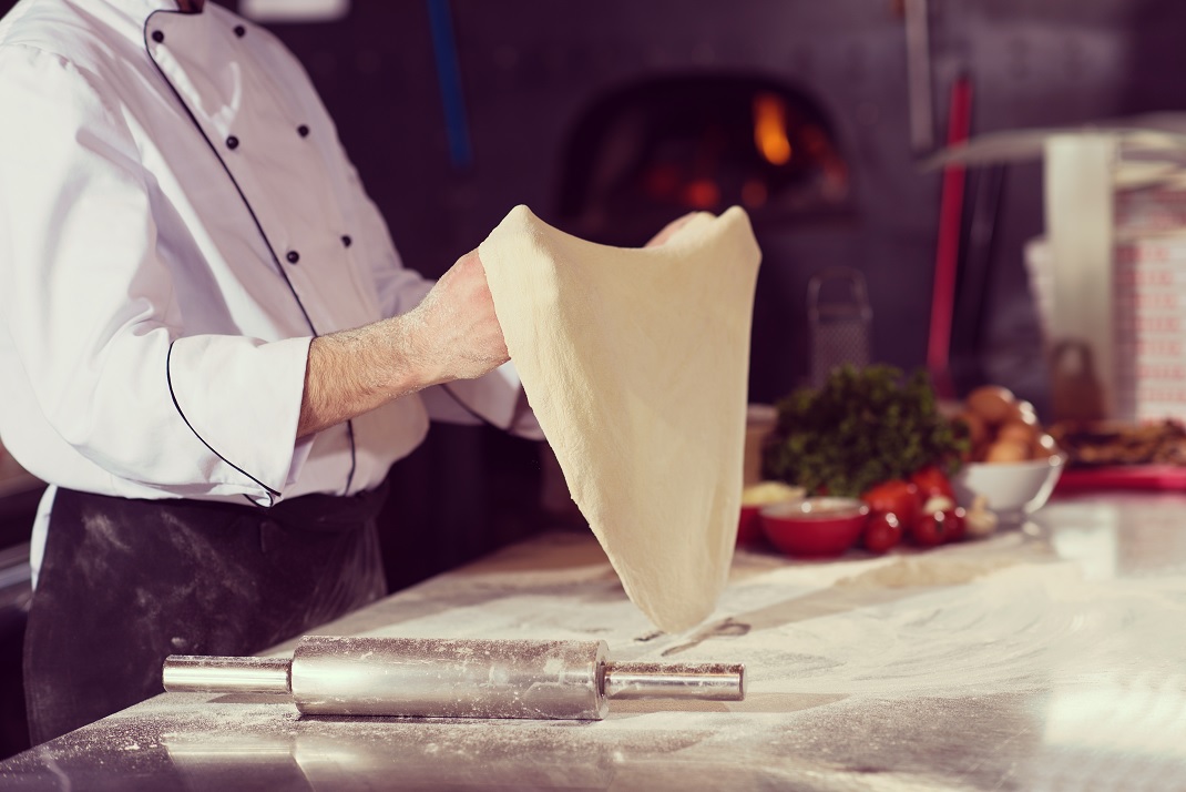 Secretul unei pizza perfecte începe cu aluatul